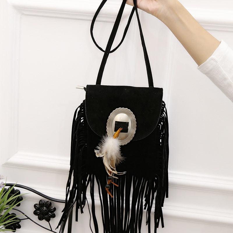 One shoulder diagonal fringe bag