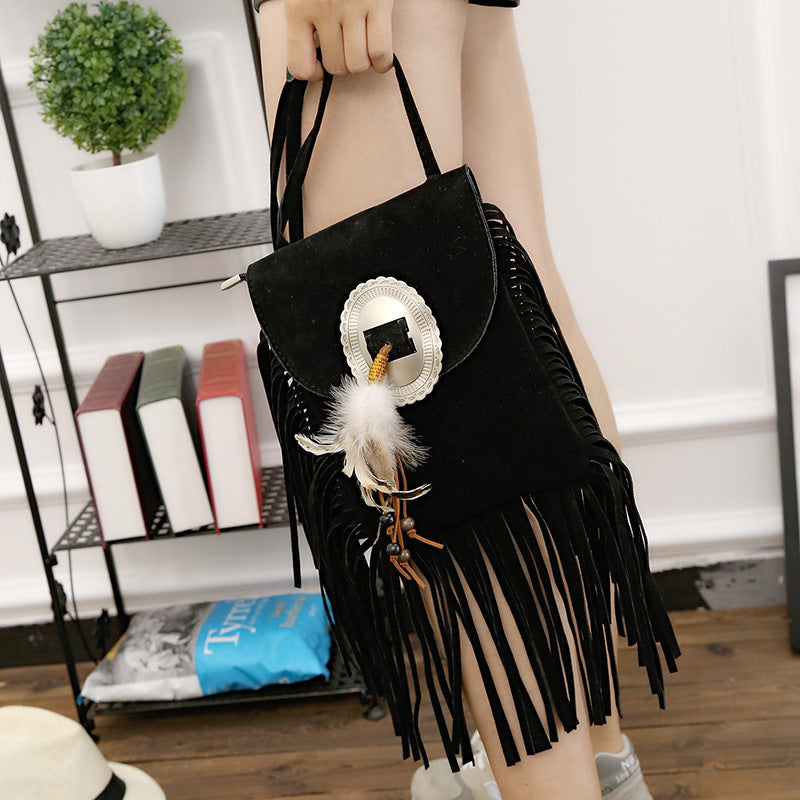 One shoulder diagonal fringe bag